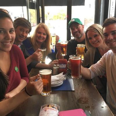 Boston pub crawl group at table