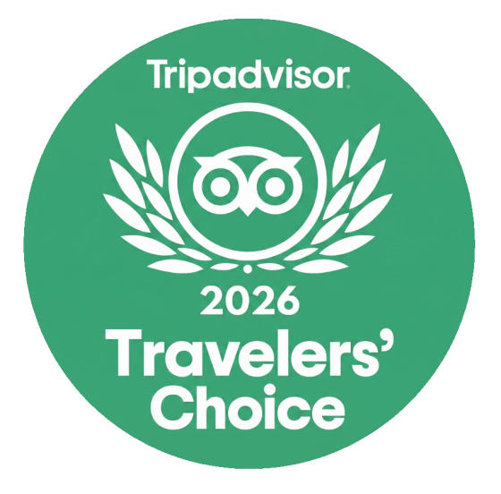 Green circle with 'Tripadvisor 2026 Travelers' Choice' and owl logo.
